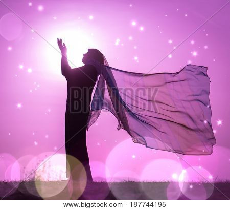  Copy space of silhouette woman rising hands on sunset sky double exposure colorful bokeh and bird fly background. Vintage tone filter effect color style.