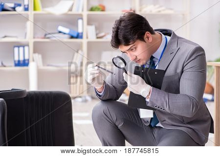 Young man during crime investigation in office