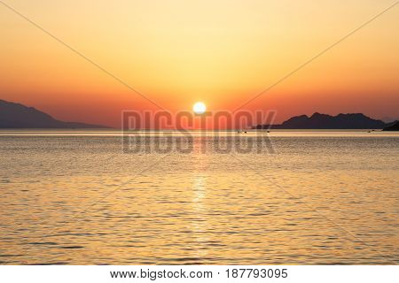 Sunset from Loutraki beach Gulf of Corinth, Greece.