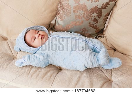 Portrait of a little adorable newborn infant asian baby.