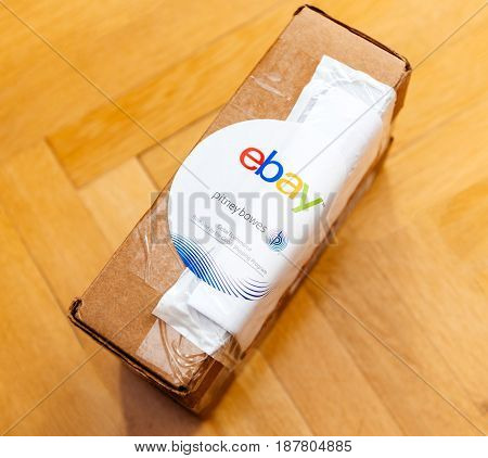 PARIS FRANCE - JUN 8 2016: Ebay and Pitney Bowens logotype printed on cardboard box security scotch tape of International Shipping Program. The Global Shipping Program simplifies selling an item to an international buyer. Ebay is the an American electroni