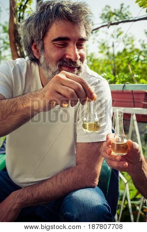 Cheers! Hand Toasting With Glasses Of Brandy