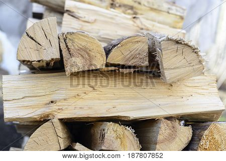 firewood background - split hardwood kiln-dried. split firewood in the stack