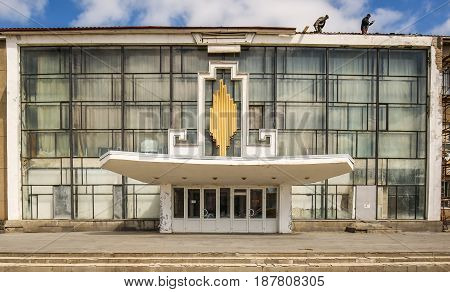 The old glass facade of the Soviet house, Russia Elista