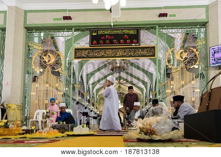 Photo of Masjid Sultan at Muscat Street in Kampong Glam district of Rochor Planning Area in Singapore. Muslim prayers inside the mosque. MARCH 2017