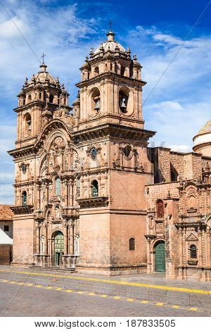 Cusco Peru - Plaza de Armas and Church of the Society of Jesus (spanish: Iglesia de la Compania de Jesus)