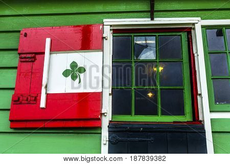 Wooden Red Green Window Windmill Zaanse Schans Old Windmill Village Countryside Holland Netherlands. Working windmills from the 16th to 18th century on the River Zaan.
