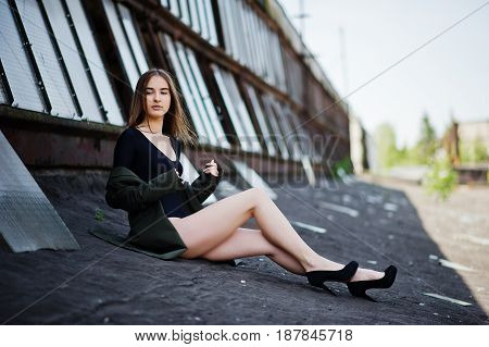 Sexy Model Girl Wit Long Legs At Black Lingerie Outfit Body Swimsuit Combidress And Jacket Posed At