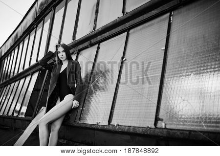 Sexy Model Girl Wit Long Legs At Black Lingerie Outfit Body Swimsuit Combidress And Jacket Posed At