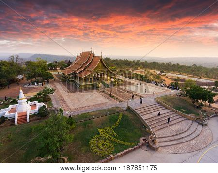 Bodhi tree glow Wat Sirindhornwararam (Phu Prao Temple) Ubon Ratchathani Thailand. temple aerial view Thailand. Wat sirindhorn wararam at night Ubon Ratchathani at Thailand sunset.