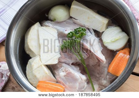 Ingredients For Preparing Chicken Bone Broth In A Pot