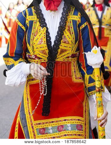 CAGLIARI, ITALY - MAY 1, 2017: 361 Religious procession of Sant'Efisio - detail of a traditional Sardinian costume - Sardinia