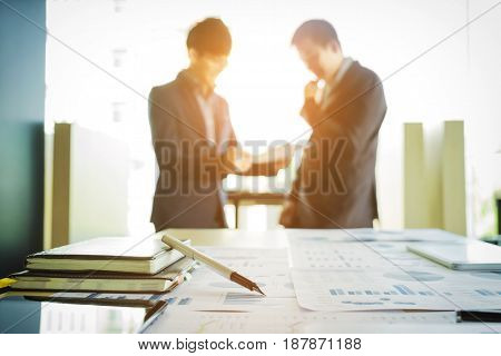 Coworkers team brainstorming process.Startup business people meeting to discuss the project and analysis the information together. Two business argue with partner blurred background.