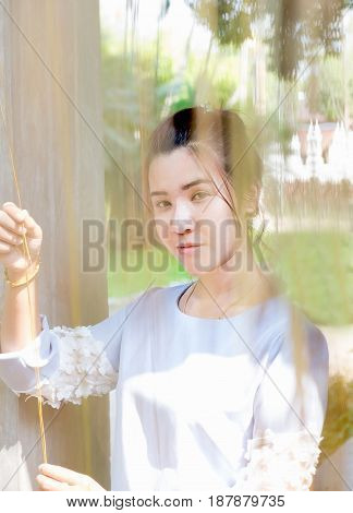 portrait of confident flirting woman with sexy look in camera