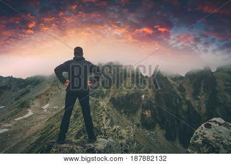 Hiker Stays On A Rocky Ridge. Instagram Stylization