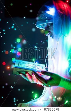 Muslim man praying for god in dark room at ramadan,colorful and vintage tone filter effect color style