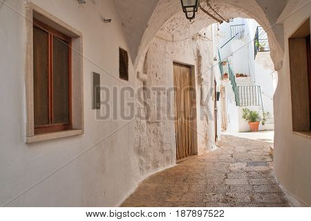 Characteristic alleyway of Cisternino. Puglia. Southern Italy.