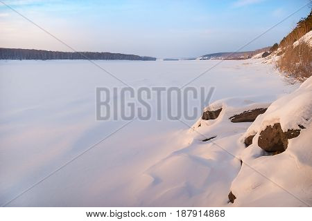 Winter, morning. Sunrise. In the frame there is a frozen river Tom. Kemerovo, Siberia, Russia.