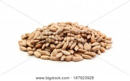 The peeled sunflower seeds isolated on white