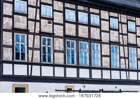Very Many windows in an old half-timbered house