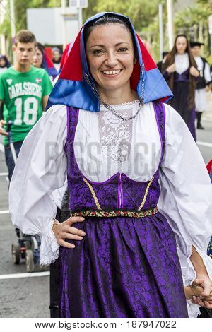 SELARGIUS, ITALY - SEPTEMBER 13, 2015: Ancient married celibacy - portrait of a beautiful woman of the folk group Santa Lucia of Seui - Sardinia