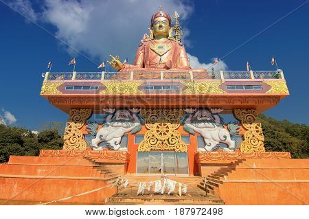 Samdruptse statue a huge buddhist memorial statue in Sikkim blue cloudy sky in background. It is a fourite tourist spot in Sikkim.