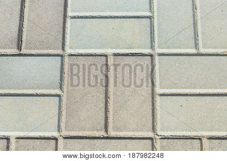 Texture of road surface made grey pave stones