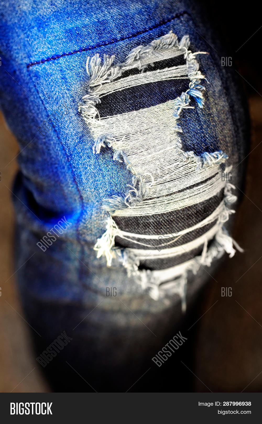 frayed blue jeans