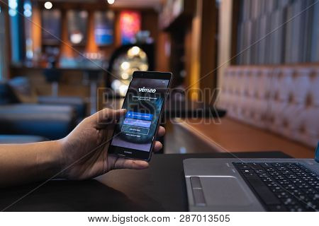 Chiang Mai, Thailand - May 05,2018: Man Holding Huawei With Vimeo On Screen.  Vimeo Is A Video-shari