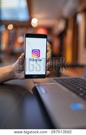 Chiang Mai, Thailand - May 05,2018: Man Holding Huawei With Instagram Application On The Screen. Ins