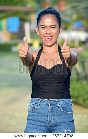 Adult Female With Thumbs Up