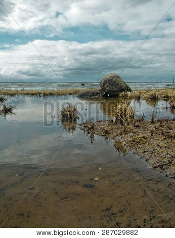 Gulf Coast, The Boulder Is In Shallow Water