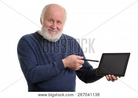 Funny bald and bearded old man using tablet computer, isolated on white