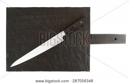 Long knife on wooden board shot from above, isolated on white background