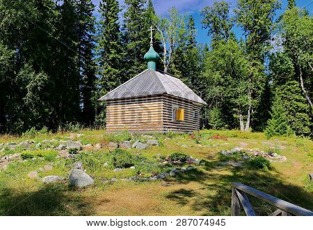 A Small Chapel In The Forest. Valaam - The Place Of Pilgrimage Of Orthodox Believers. Wooden Archite