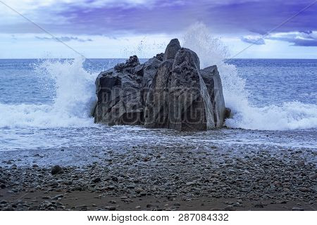 Waves Splashing At The Rock At Sunset. Praia Formosa Beach In Funchal, Portugal