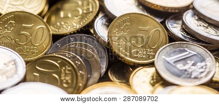 Close-up A Pile Of New Euro Coins In Other Compositions.