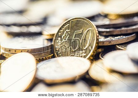 Close-up A Pile Of New Euro Coins In Other Compositions
