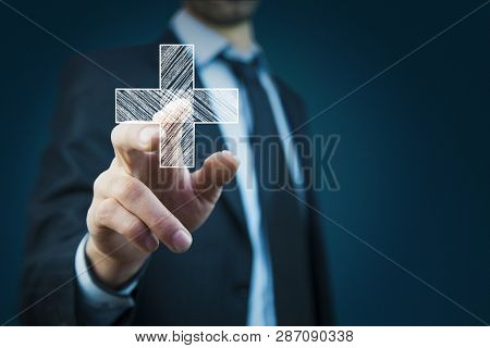 Man Touching Plus Or Cross Sign In Screen