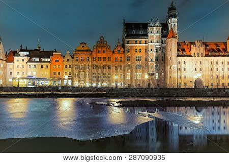 Mariacka Gate And Other Sights Of Gdansk On The Bank Of The Motlawa, Evening View
