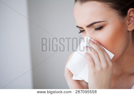 Flu And Sick Woman. Sick Woman Using Paper Tissue, Head Cold Problem
