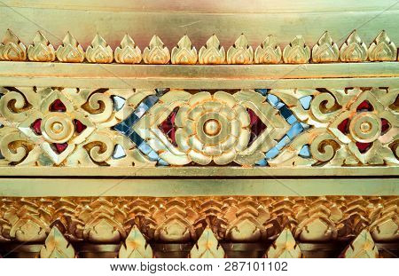 Closeup Thai Pattern Carving Kanok Picture At Door In Temple