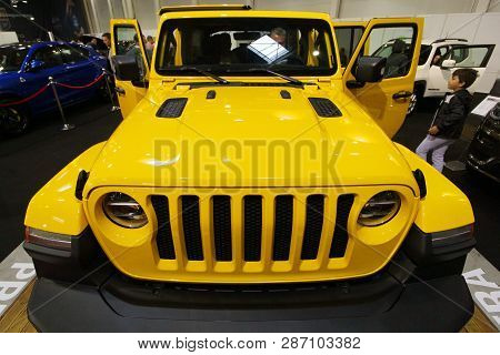 Bucharest, Romania - October 21, 2018: An Yellow 2018 Wrangler Jk Sahara Car Is Exposed At The Bucha