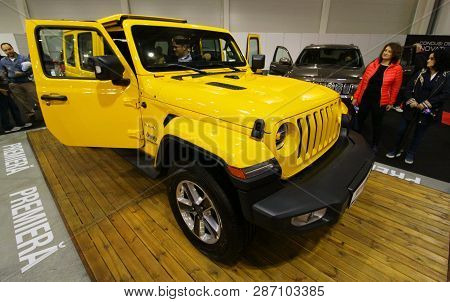 Bucharest, Romania - October 21, 2018: An Yellow 2018 Wrangler Jk Sahara Car Is Exposed At The Bucha