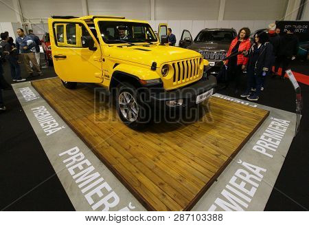 Bucharest, Romania - October 21, 2018: An Yellow 2018 Wrangler Jk Sahara Car Is Exposed At The Bucha