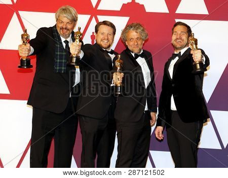 Ian Hunter, J.D. Schwalm, Paul Lambert and Tristan Myles at the 91st Annual Academy Awards - Press Room held at the Loews Hotel in Hollywood, USA on February 24, 2019.