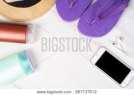 Smartphone, Flip-flops, Sunscreen And Hat.