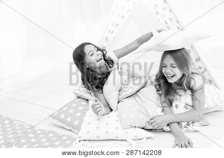 Pajamas Party For Kids. Girls Having Fun Tipi House. Girlish Leisure. Sisters Share Gossips Having F