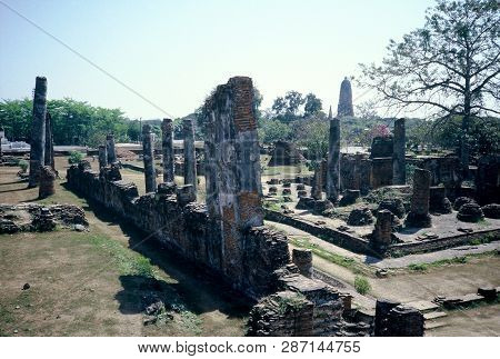 The Ancient Ruins Of Wat Phra Mahathat In Ayutthaya, Thailand.
