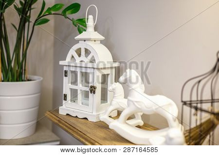 Interior Decoration Toys. White Decorative Wooden Latern Lights And Ceramic Horses In Expensive Inte